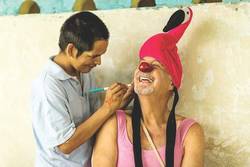 Dr. Carl A. Hammerschlag transforms into a clown clinician at the Belén Festival in Iquitos, Peru.